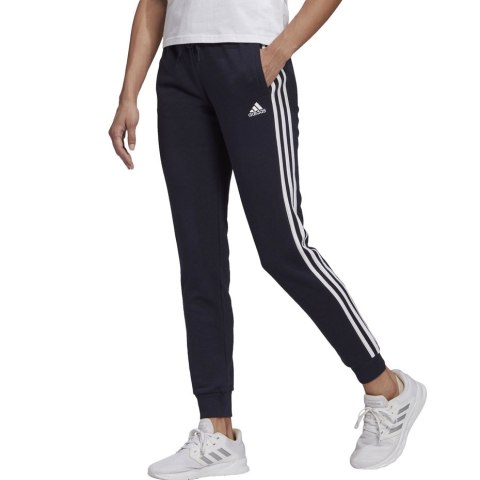 Adidas Spodnie damskie adidas Essentials Slim Tapered Cuffed Pant granatowe GM8736