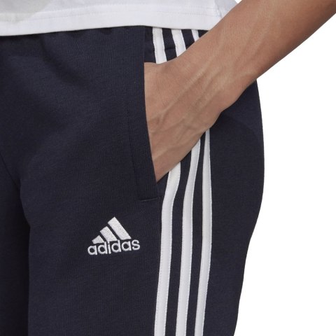 Adidas Spodnie damskie adidas Essentials Slim Tapered Cuffed Pant granatowe GM8736