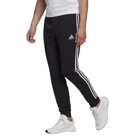 Adidas Spodnie męskie adidas Essentials Tapered Cuff 3 Stripes czarne GK8831