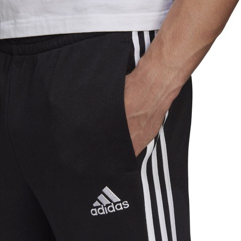 Adidas Spodnie męskie adidas Essentials Tapered Cuff 3 Stripes czarne GK8831