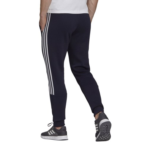 Adidas Spodnie męskie adidas Essentials Tapered Cuff 3 Stripes granatowe GK8977