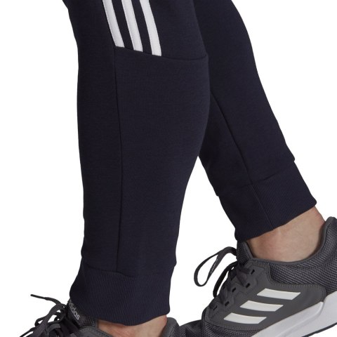 Adidas Spodnie męskie adidas Essentials Tapered Cuff 3 Stripes granatowe GK8977