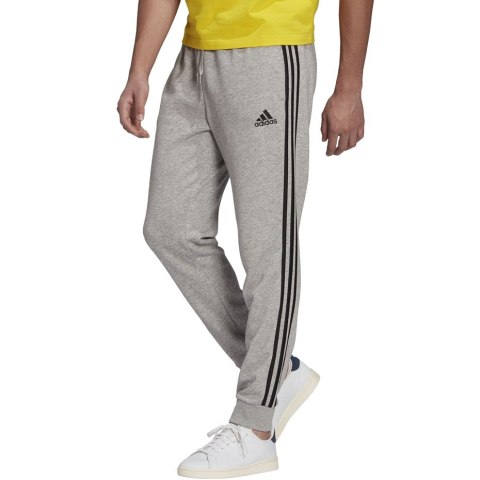 Adidas Spodnie męskie adidas Essentials Tapered Cuff 3 Stripes szare GK8889