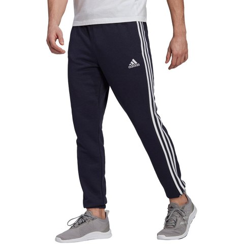Adidas Spodnie męskie adidas Essentials Tapered Elastic Cuff 3 Stripes Pant granatowe GK8830