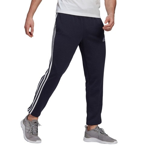 Adidas Spodnie męskie adidas Essentials Tapered Elastic Cuff 3 Stripes Pant granatowe GK8830