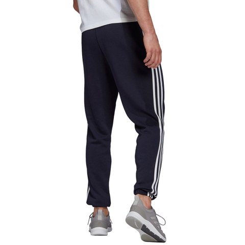 Adidas Spodnie męskie adidas Essentials Tapered Elastic Cuff 3 Stripes Pant granatowe GK8830