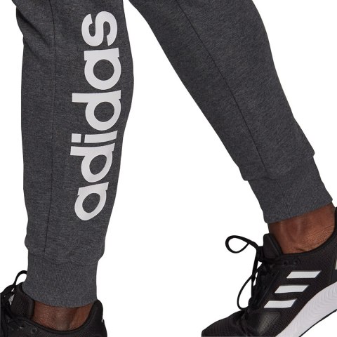 Adidas Spodnie damskie adidas Essentials Slim Tapered Cuffed Pant ciemnoszare HA0265