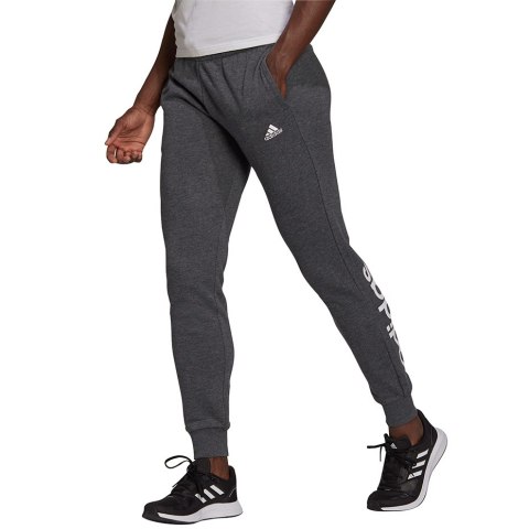 Adidas Spodnie damskie adidas Essentials Slim Tapered Cuffed Pant ciemnoszare HA0265