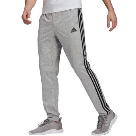 Adidas Spodnie męskie adidas Essentials Single szare GK8998