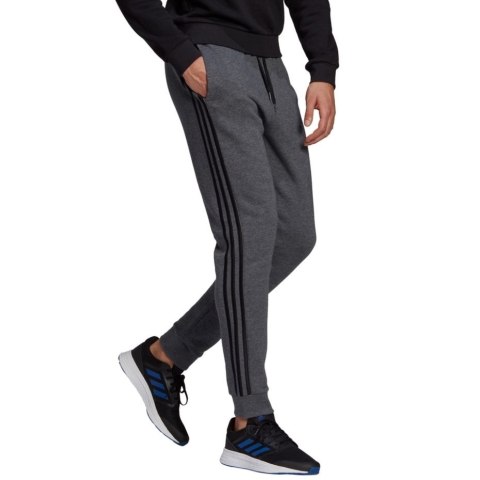 Adidas Spodnie męskie adidas Essentials Tapered Cuff 3 Stripes ciemnoszare GK8826