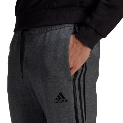 Adidas Spodnie męskie adidas Essentials Tapered Cuff 3 Stripes ciemnoszare GK8826