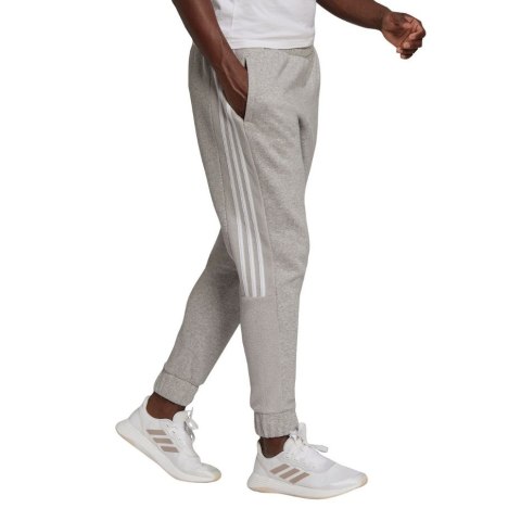 Adidas Spodnie damskie adidas Essentials Colorblock Block Cut 3-Stripes Regular Tapered Pants szare HB2768