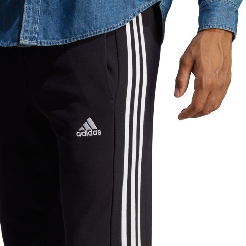 Adidas Spodnie męskie adidas Essentials French Terry Tapered Cuff 3-Stripes czarne HA4337