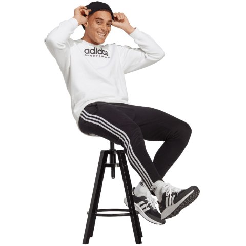 Adidas Spodnie męskie adidas Essentials Single Jersey Tapered Open Hem 3-Stripes czarne IC0044
